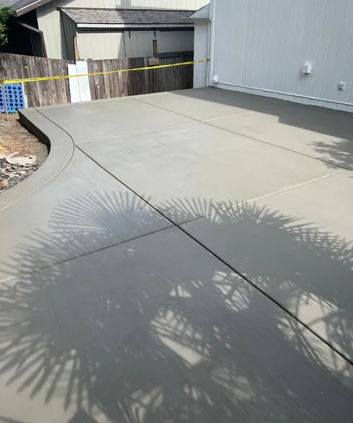 Broom finish patio and decorative borders in Covington 